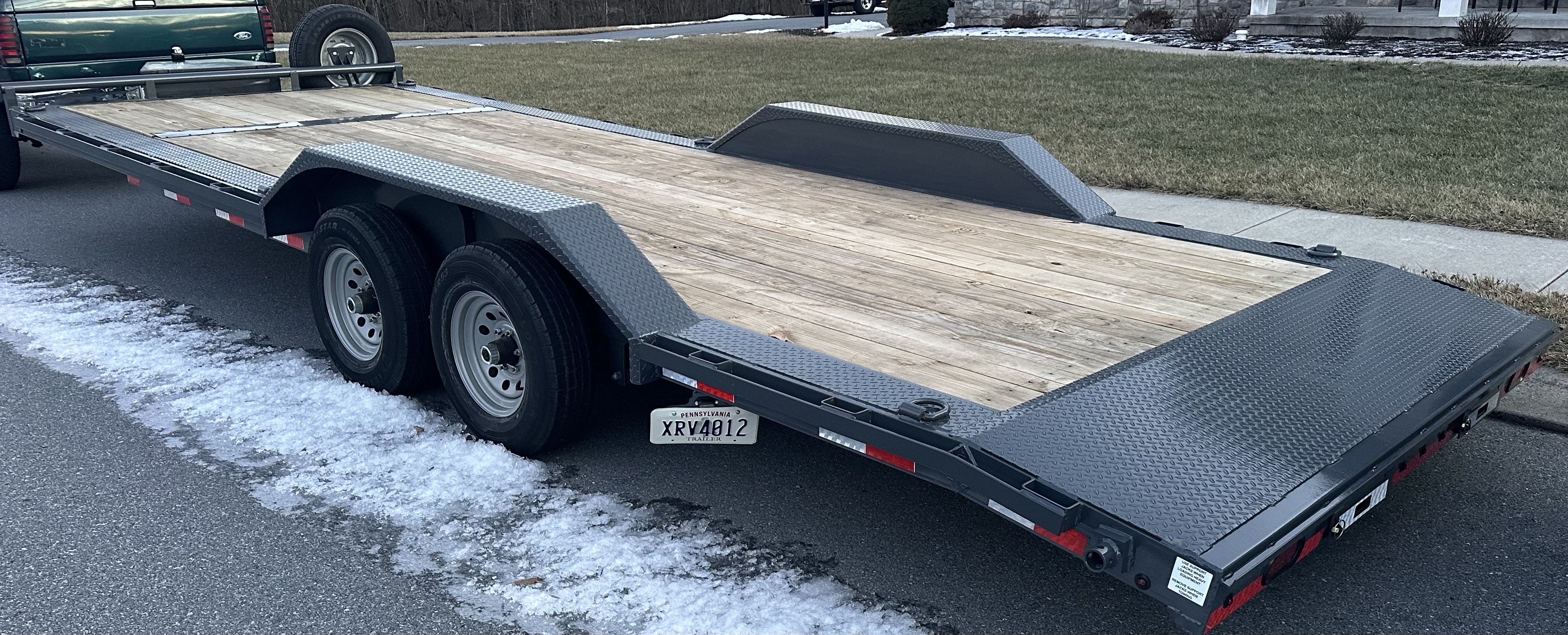2026 Lamar 24ft Car Hauler Flatbed Trailer with 6,740 lbs capacity - available for rent at K.W. Trailers in Myerstown, PA